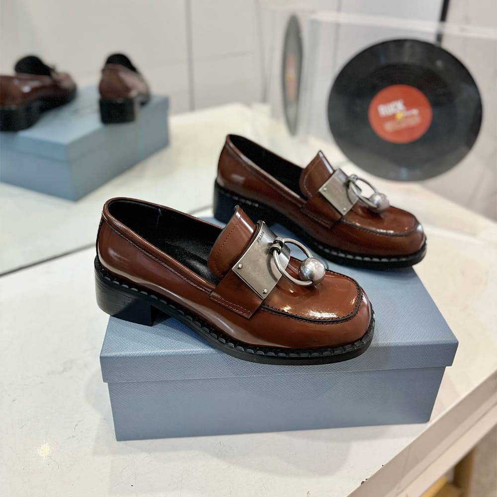 Pra*a Brushed leather loafers with metal details