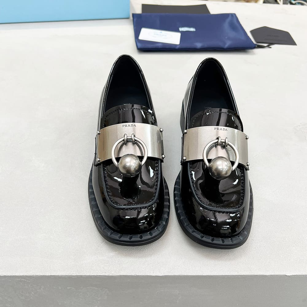 Pra*a Brushed leather loafers with metal details
