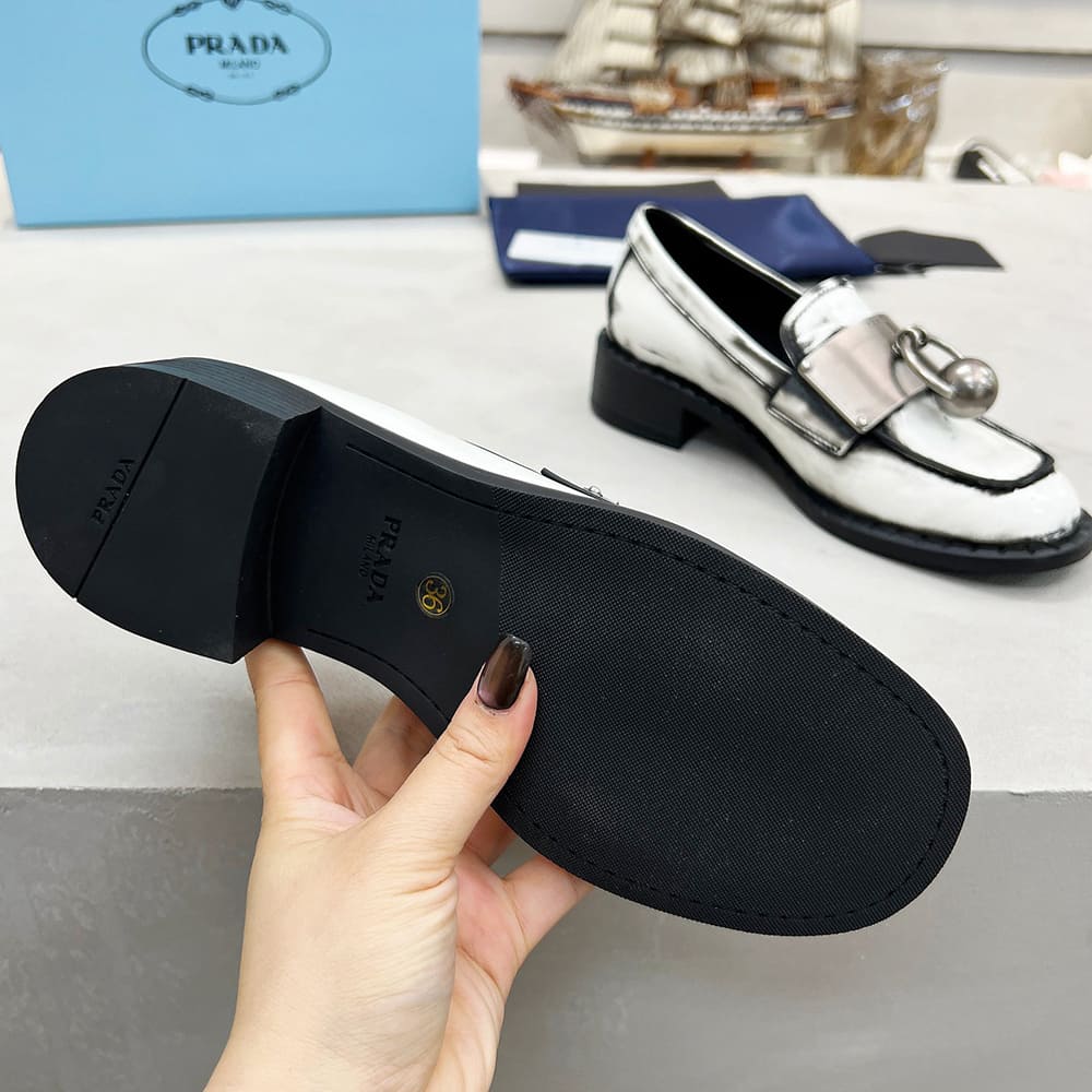 Pra*a Brushed leather loafers with metal details