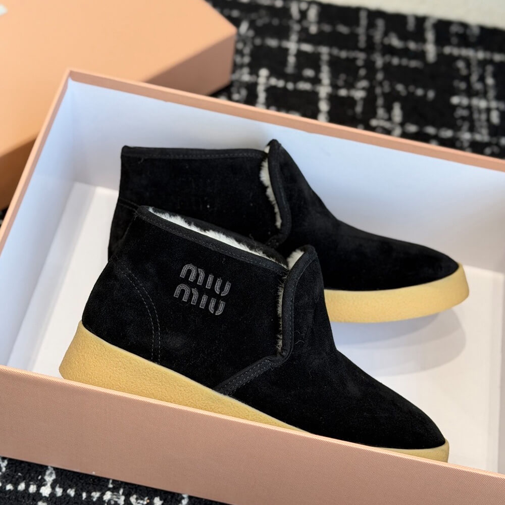 M1um1u Suede and shearling slip-on booties
