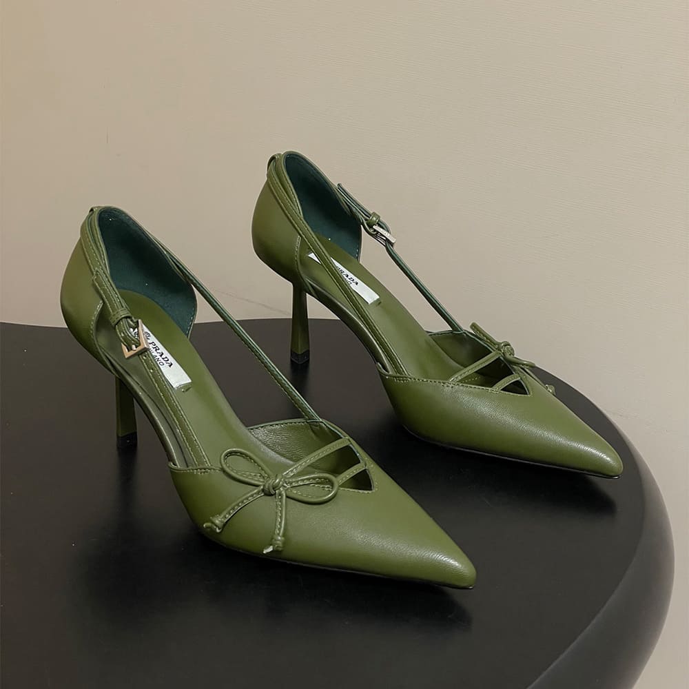 Pra*a Open-side leather pumps