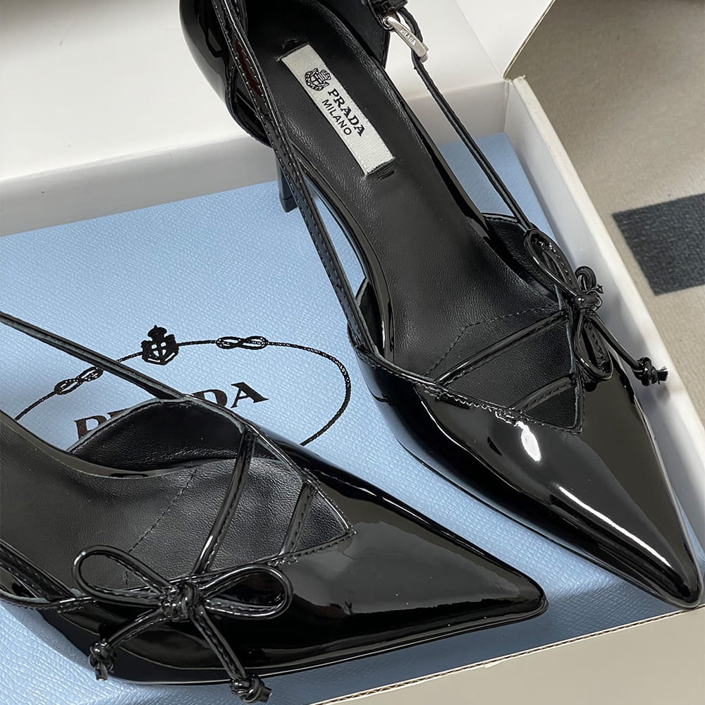 Pra*a Open-side leather pumps